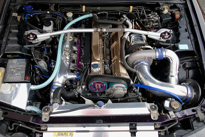 One big turbo dominates the engine bay. 