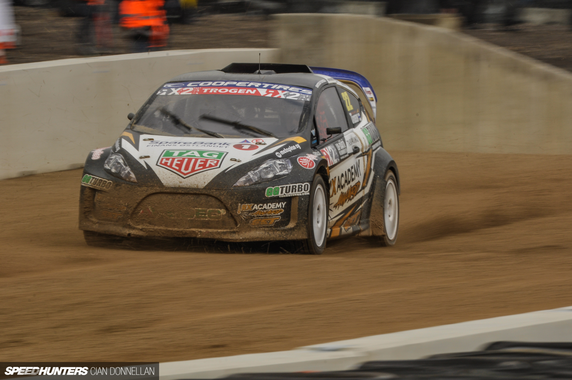 supercars racing in the mud